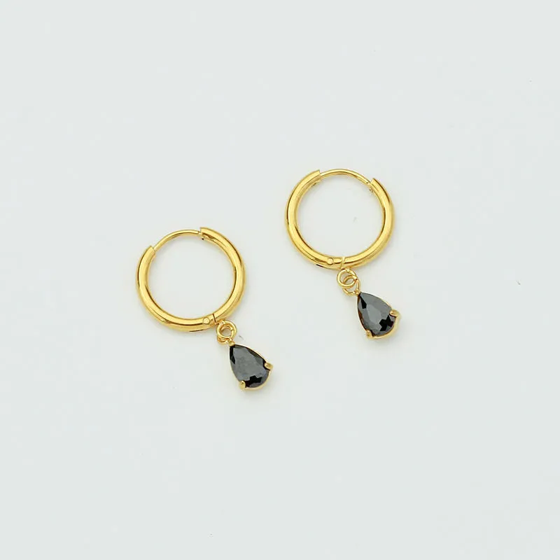 Drop-shaped zircon earrings in seven colours on a woman's earlobe titanium steel geometric design