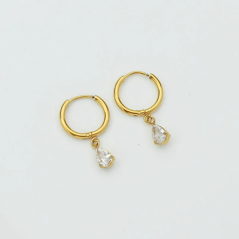Drop-shaped zircon earrings in seven colours on a woman's earlobe titanium steel geometric design