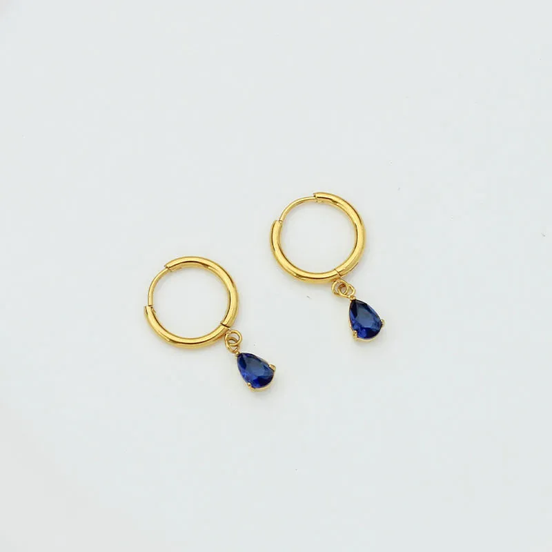 Drop-shaped zircon earrings in seven colours on a woman's earlobe titanium steel geometric design
