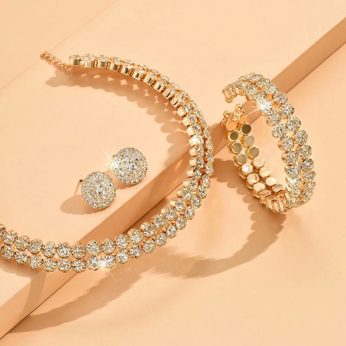 Women's rhinestone double-layer necklace and bracelet with stud earrings in gold set