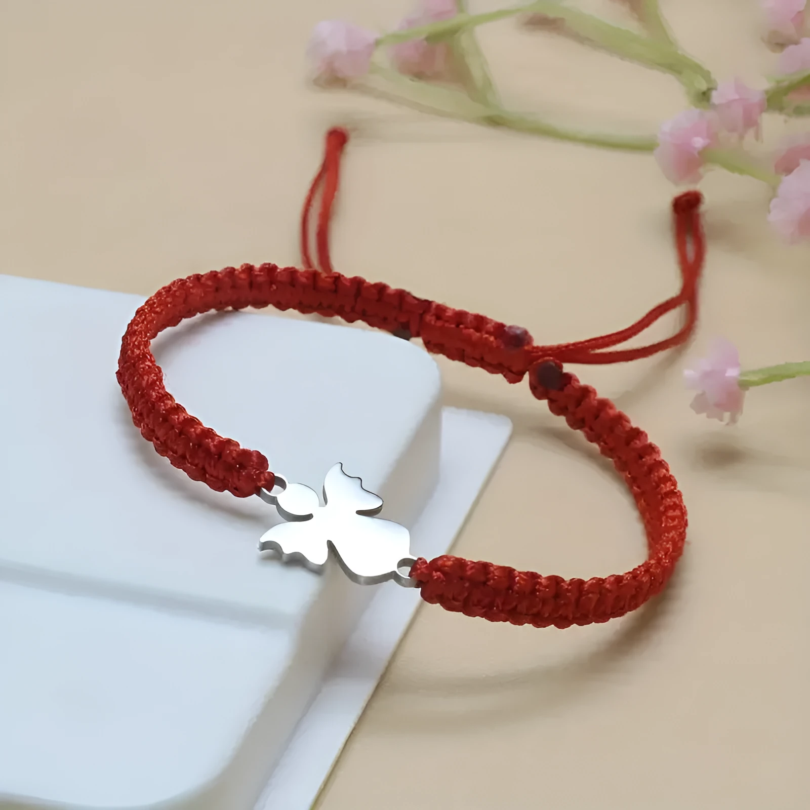 Cute stainless steel hand-woven angel bracelet in red, blue, black, and white unisex couple style