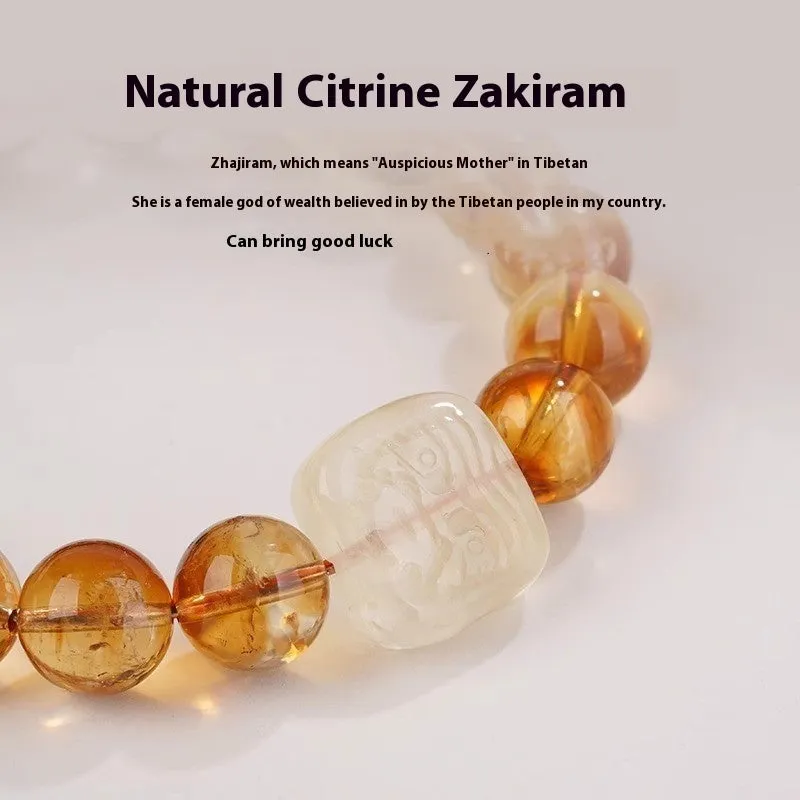 Women's carved citrine bracelet with geometric ethnic patterning, 10mm crystal construction