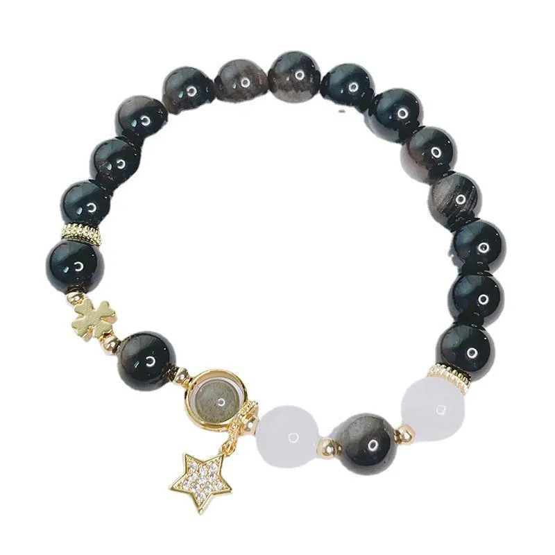 Women's silverstone charm bracelet with electroplated finish showing floral, heart, and star design options