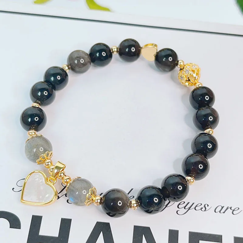 Women's silverstone charm bracelet with electroplated finish showing floral, heart, and star design options
