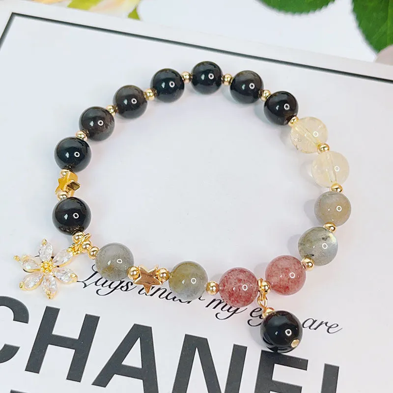 Women's silverstone charm bracelet with electroplated finish showing floral, heart, and star design options