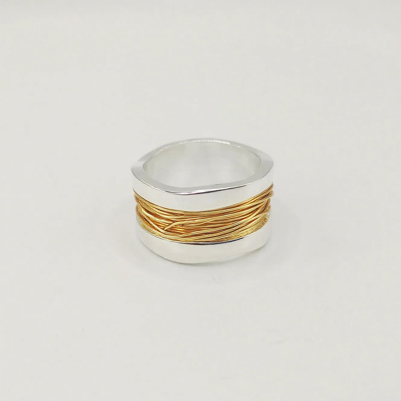 Hand-wound real copper wire wide surface bracelet in two-tone geometric design, electroplated finish
