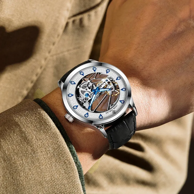 Men's silver mechanical watch with white dial, blue luminous hands, and a black leather strap.