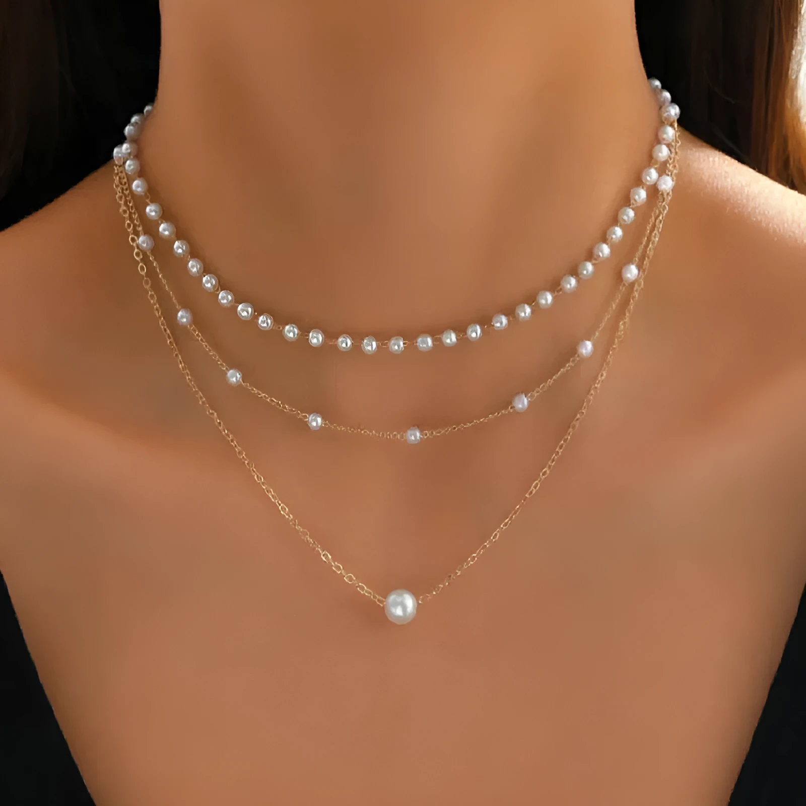 Three-layer gold imitation pearl necklace with twin pendant leaf U-shaped geometric design