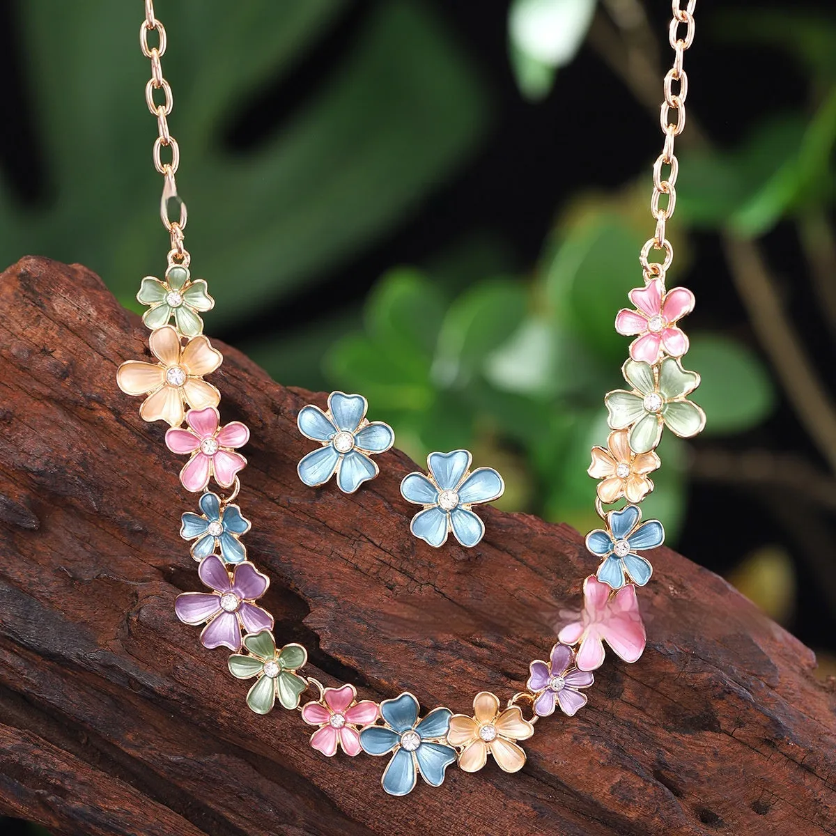 Zinc alloy flower stitching colourful oil necklace and earring set for women with cross chain style