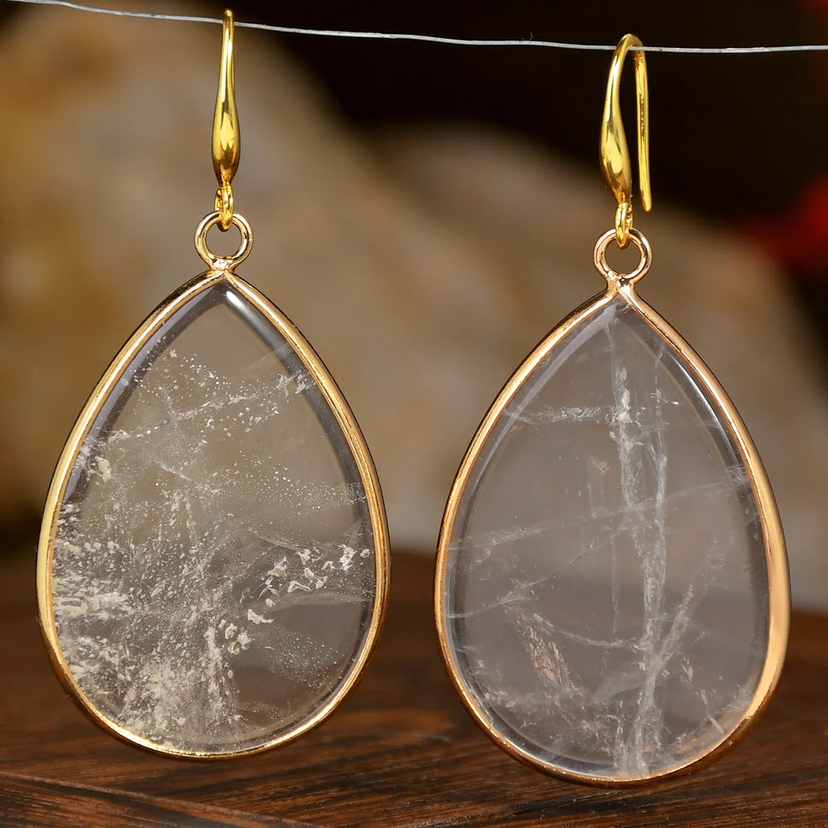 Women's retro-style drop earrings with a natural stone pendant in green aventurine on electroplated settings.