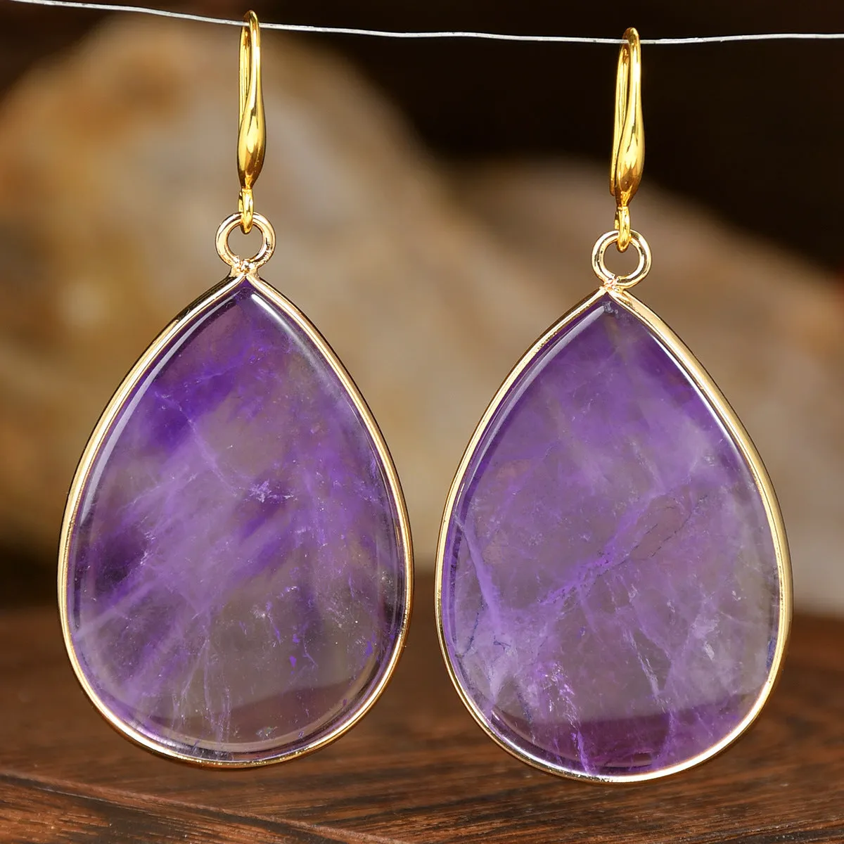 Women's retro-style drop earrings with a natural stone pendant in green aventurine on electroplated settings.