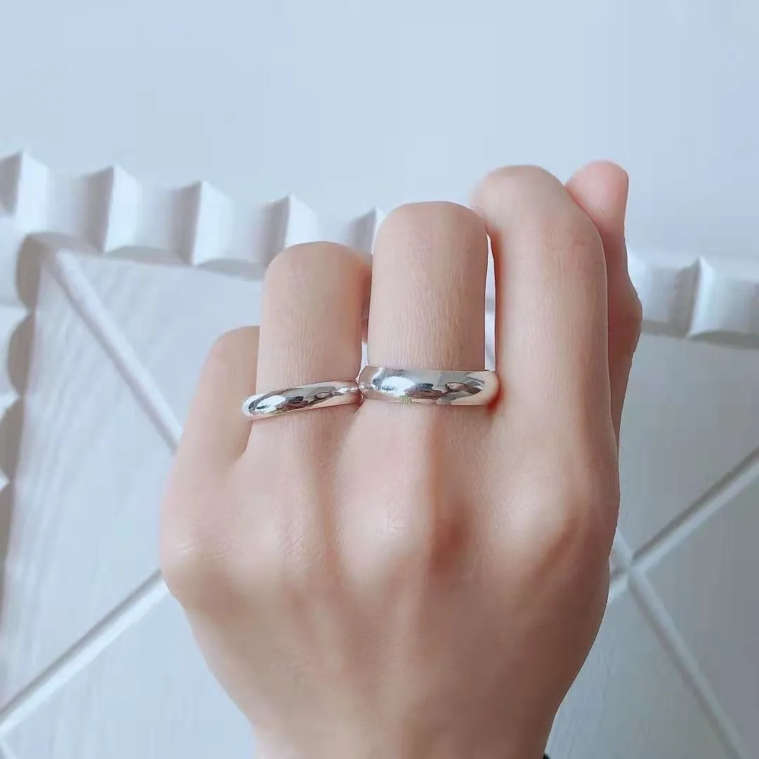 Unisex adjustable metal ring with silver or gold plating, geometric shape