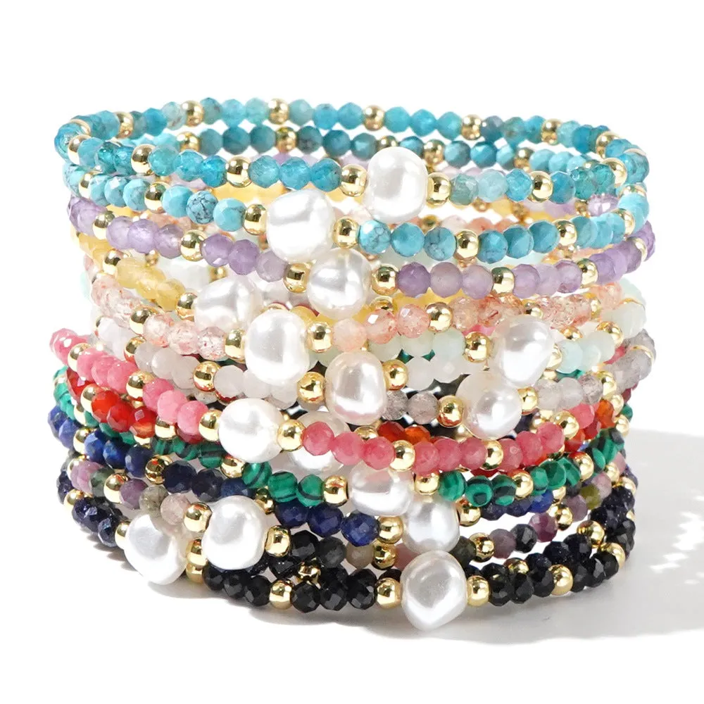A unisex natural stone bracelet with elliptical geometric beads on a wrist, shown in one of the multiple available colours.