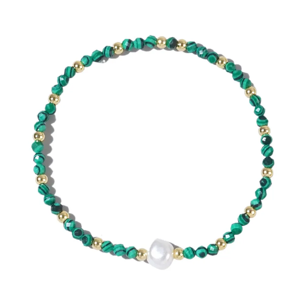 A unisex natural stone bracelet with elliptical geometric beads on a wrist, shown in one of the multiple available colours.