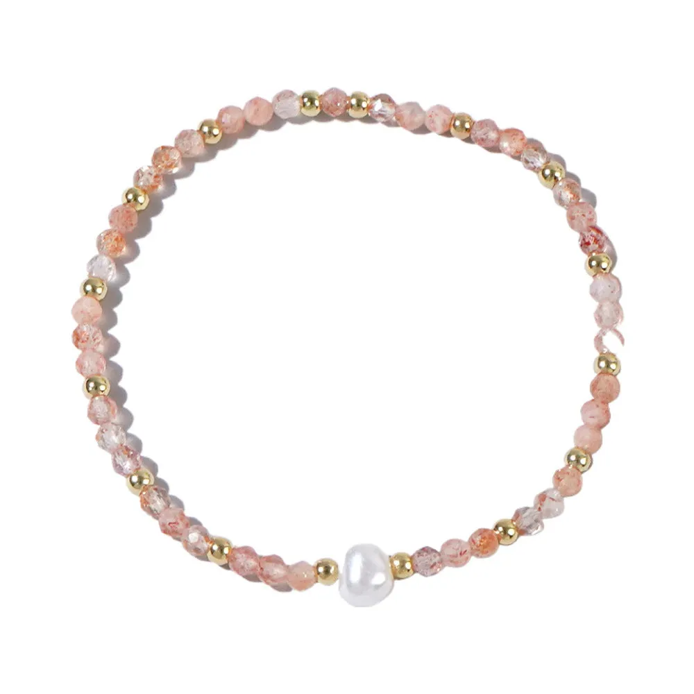 A unisex natural stone bracelet with elliptical geometric beads on a wrist, shown in one of the multiple available colours.