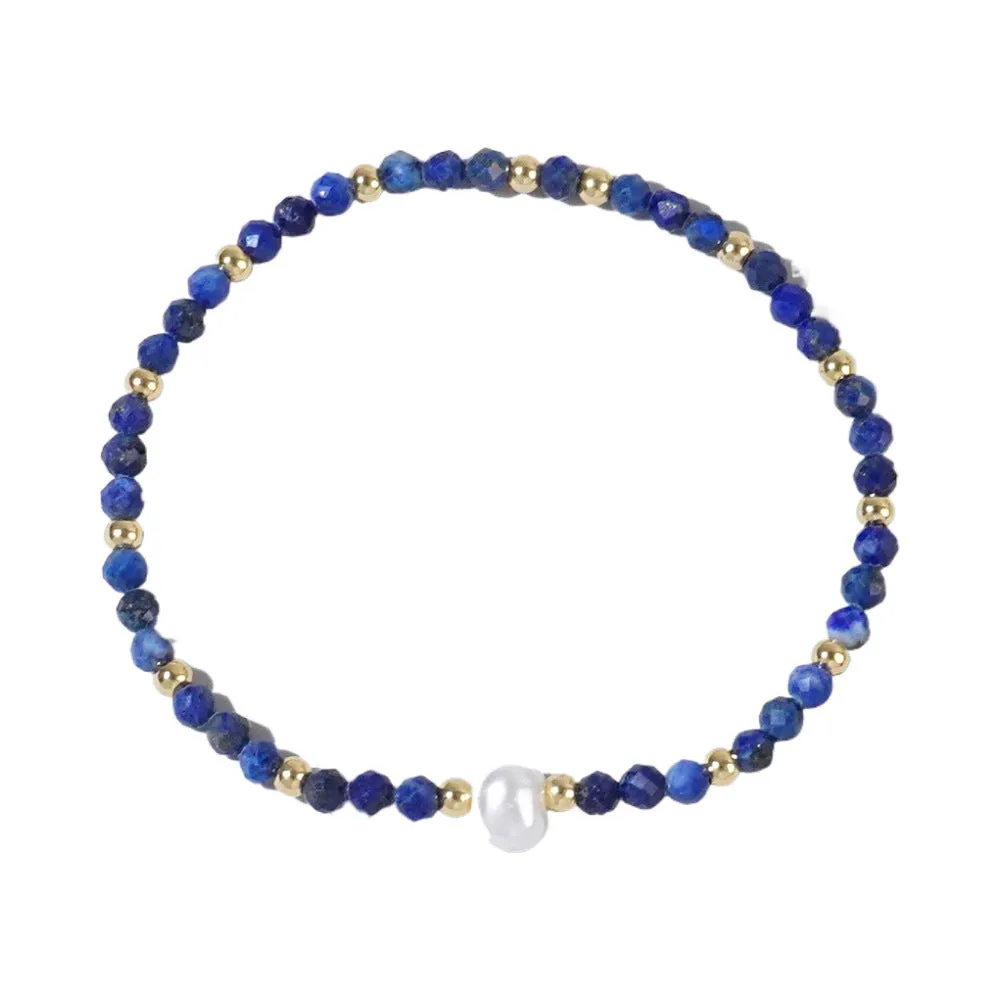 A unisex natural stone bracelet with elliptical geometric beads on a wrist, shown in one of the multiple available colours.
