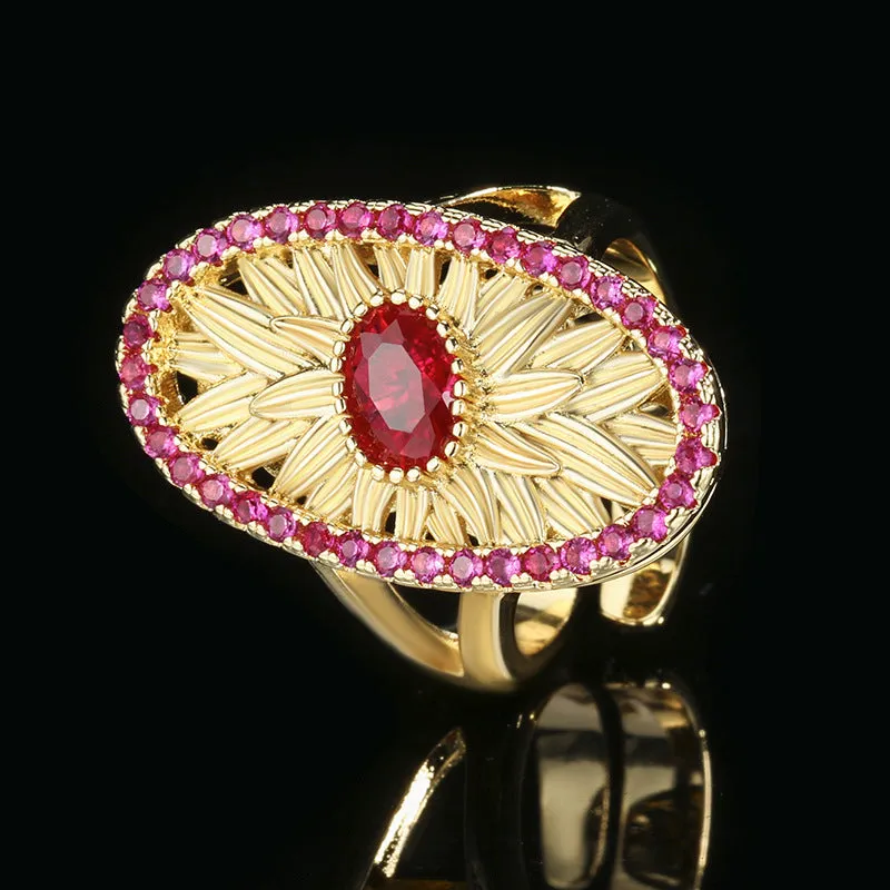 Gold-plated red corundum jewellery set showing necklace, ring and ear studs with diamond-cut water drop design