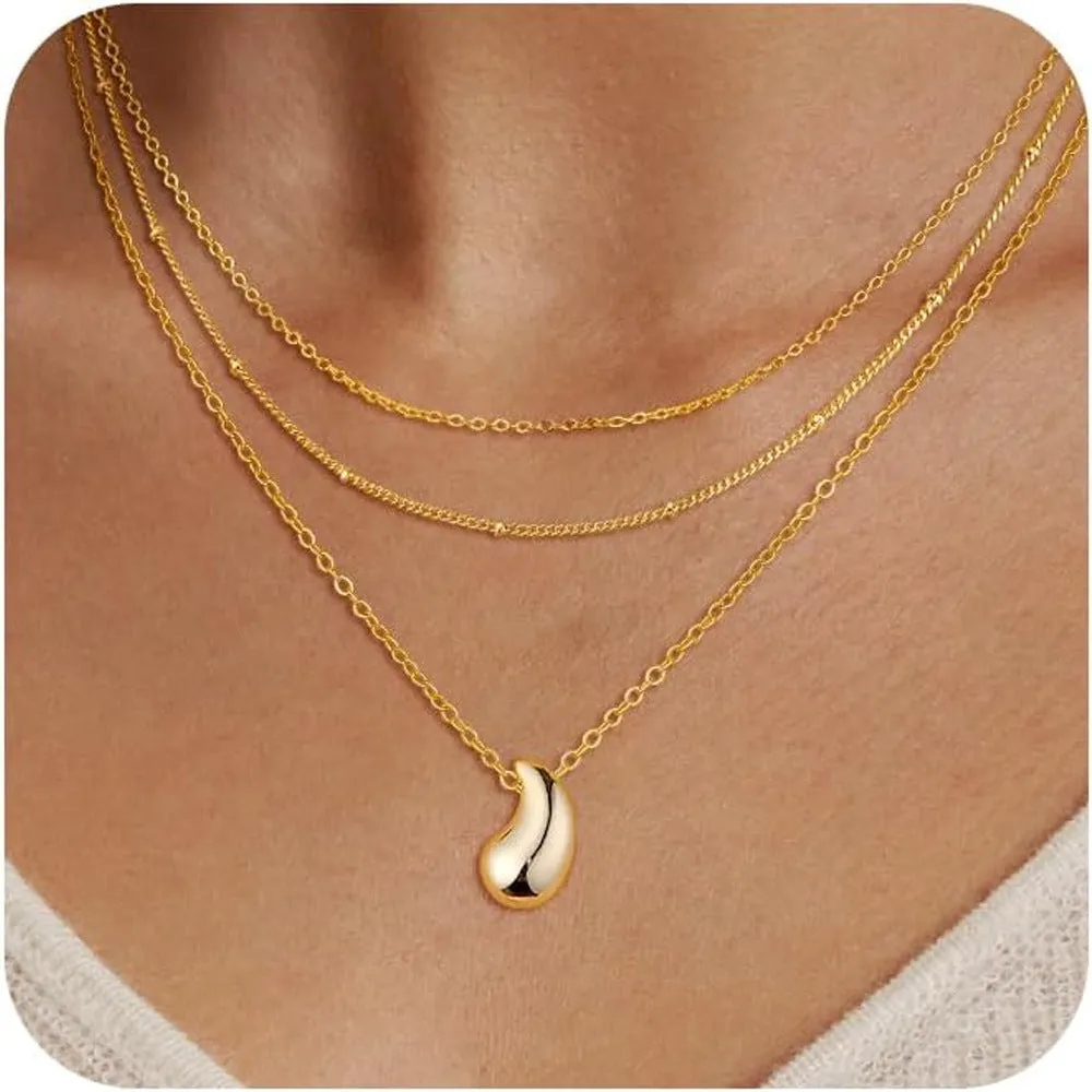 Copper electroplated layered clip necklace with circle pendant in gold finish