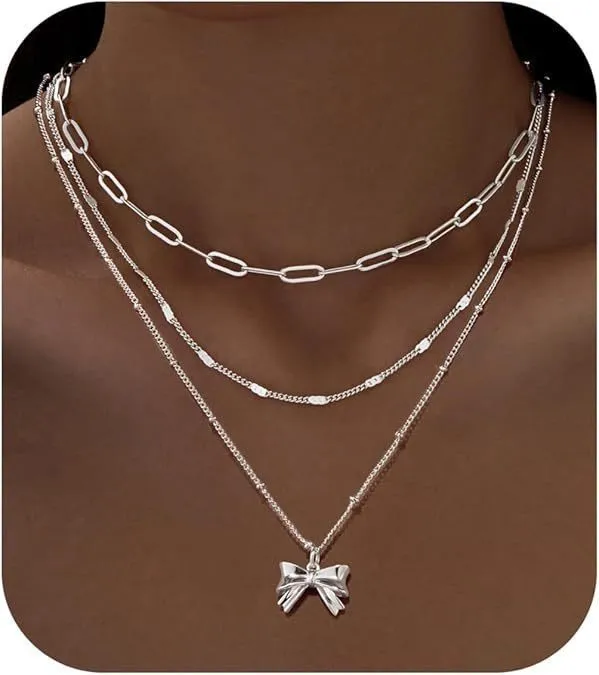 Copper electroplated layered clip necklace with circle pendant in gold finish