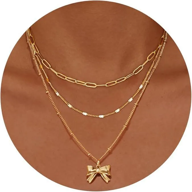 Copper electroplated layered clip necklace with circle pendant in gold finish