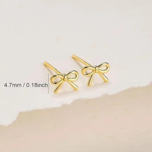 Women's gold bow and cross stud earrings geometric design electroplated finishes