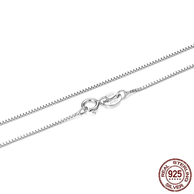 S925 sterling silver box chain necklace in silver colour, 40cm length on flat surface