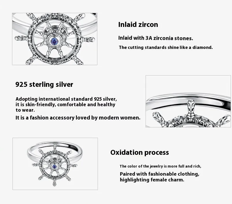 Retro women's silver ring with rotatable rudder design and inlaid zircon stone on open mouth band.