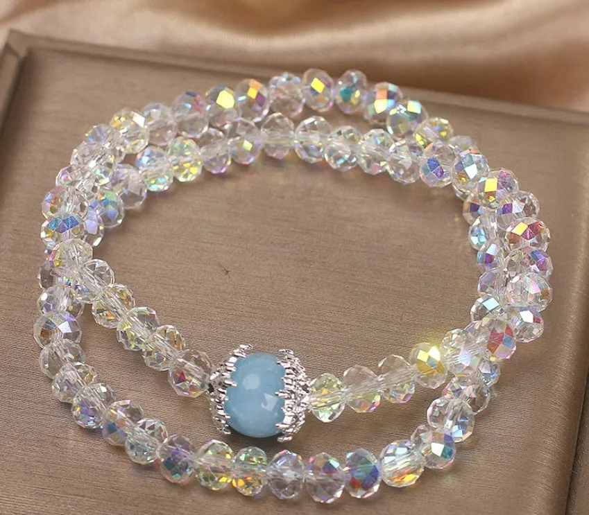 White crystal double ring bracelet for women with electroplated finish on light background