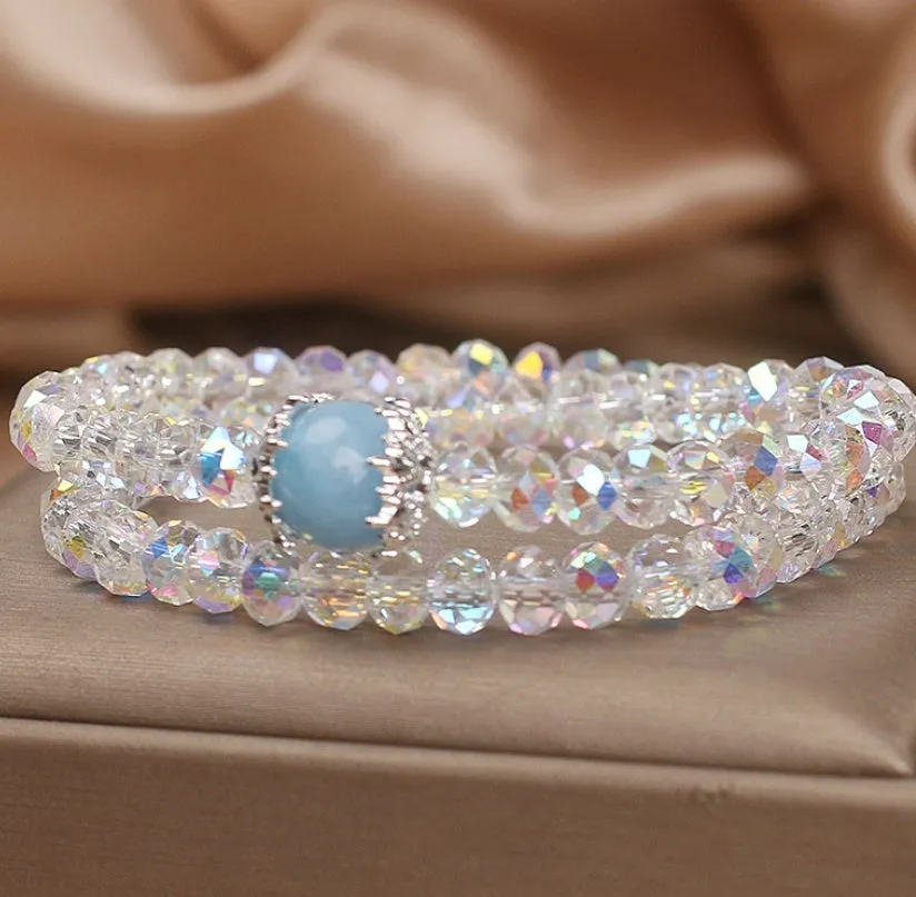 White crystal double ring bracelet for women with electroplated finish on light background