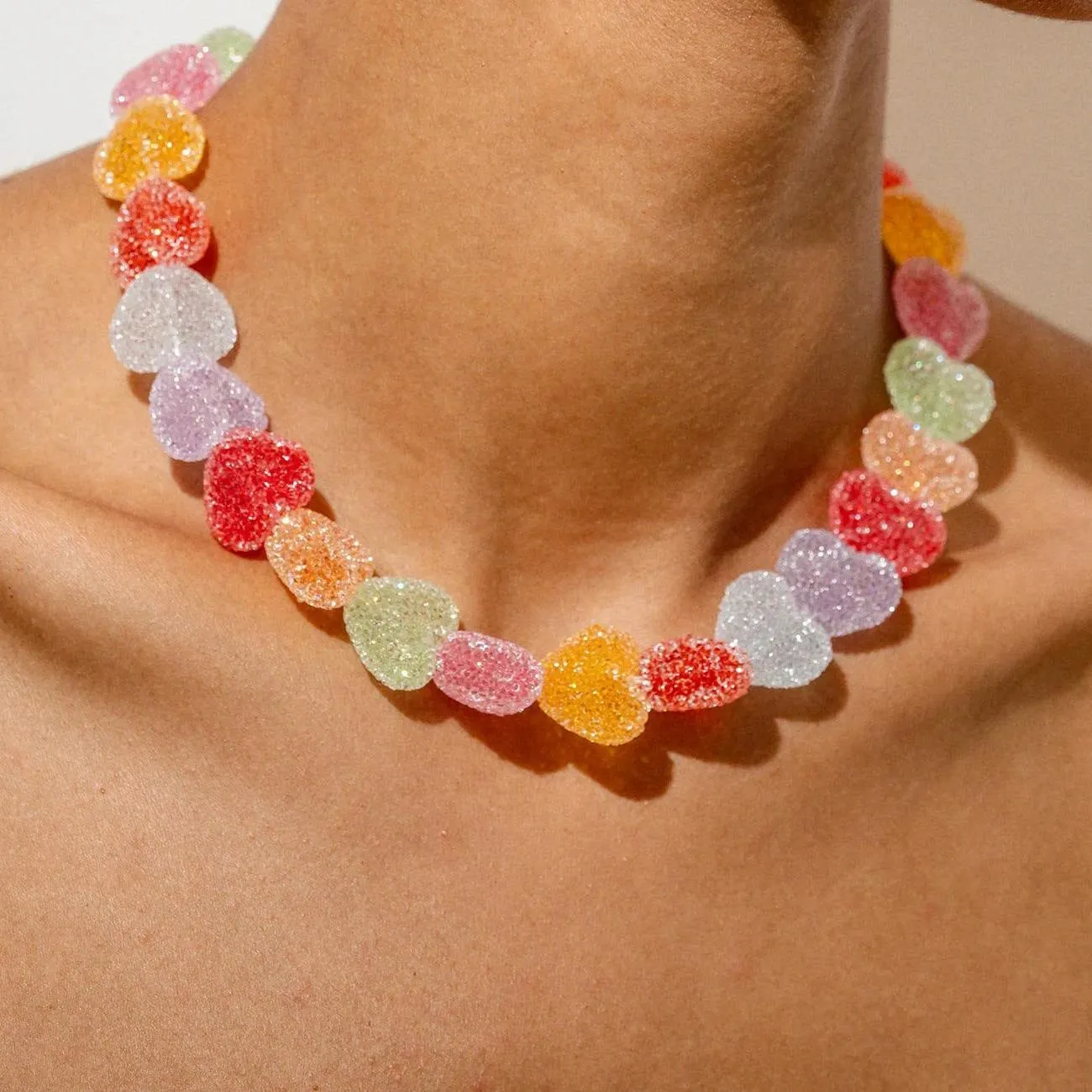 Colored loving heart resin necklace and earrings set with heart-shaped pendant and matching earrings in candy colours
