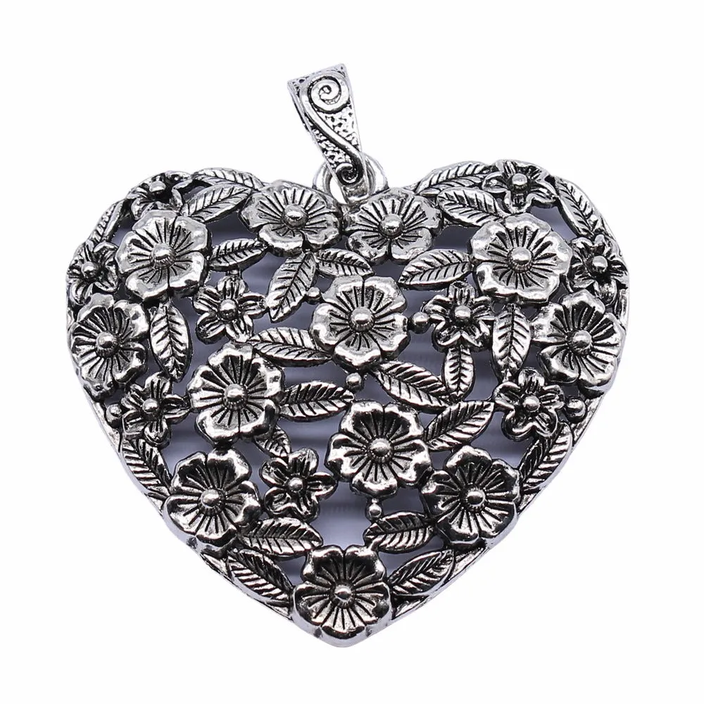 Ancient silver hollow flower love pendant measuring 67mm by 58mm with electroplated finish