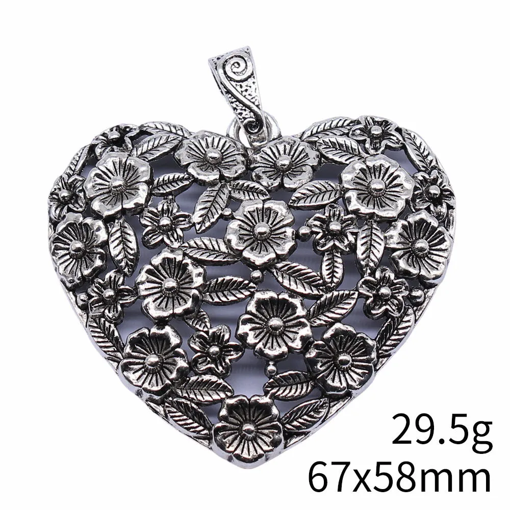 Ancient silver hollow flower love pendant measuring 67mm by 58mm with electroplated finish