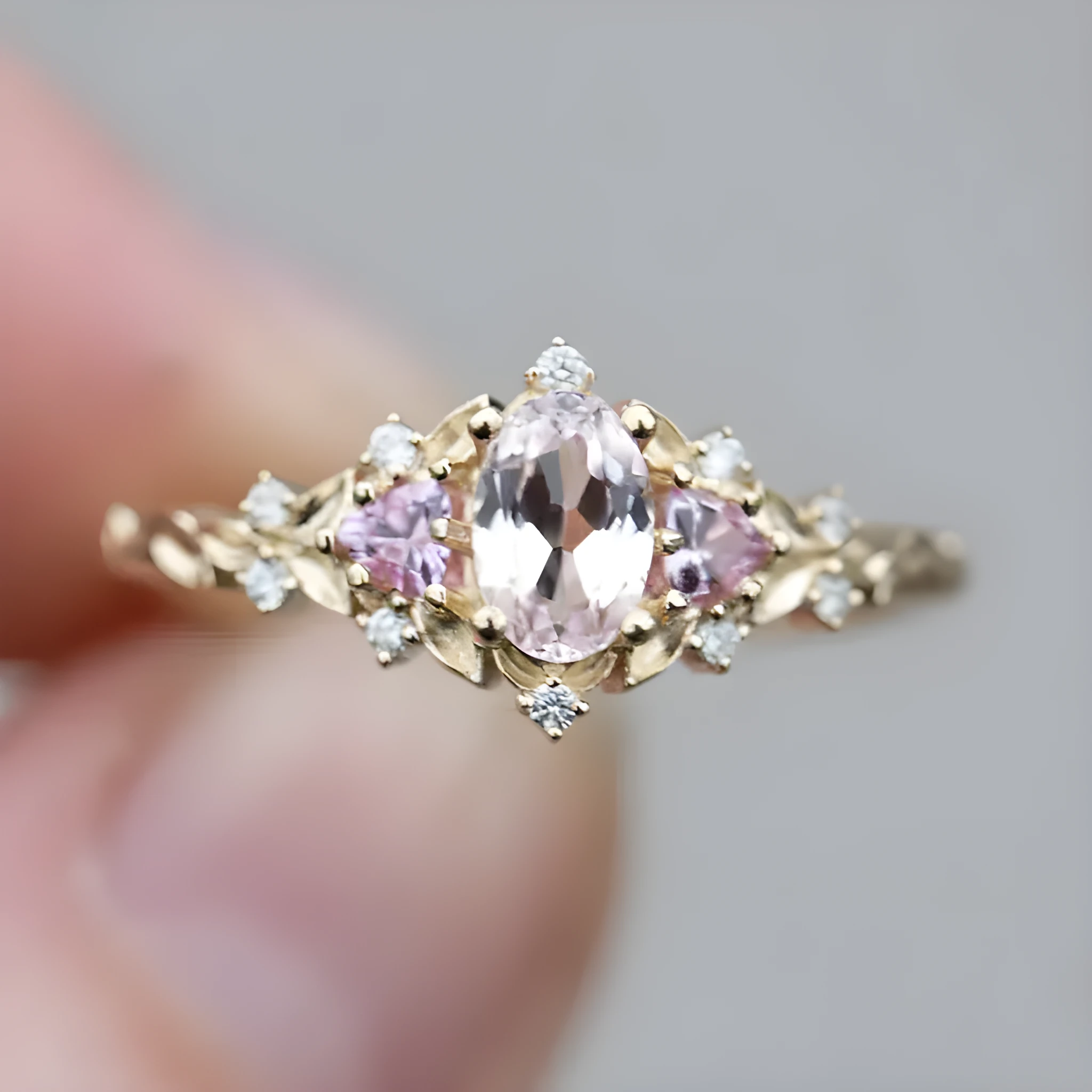 Women's alloy flower ring with inlaid zircon in gold pink diamond colour on white background
