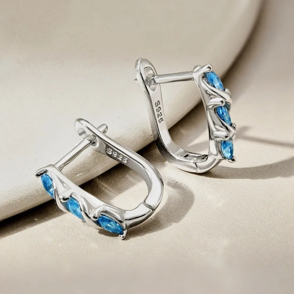 925 silver women's earrings with blue zircon inlay and platinum blue diamond electroplated finish in compact 3x14x15mm size.