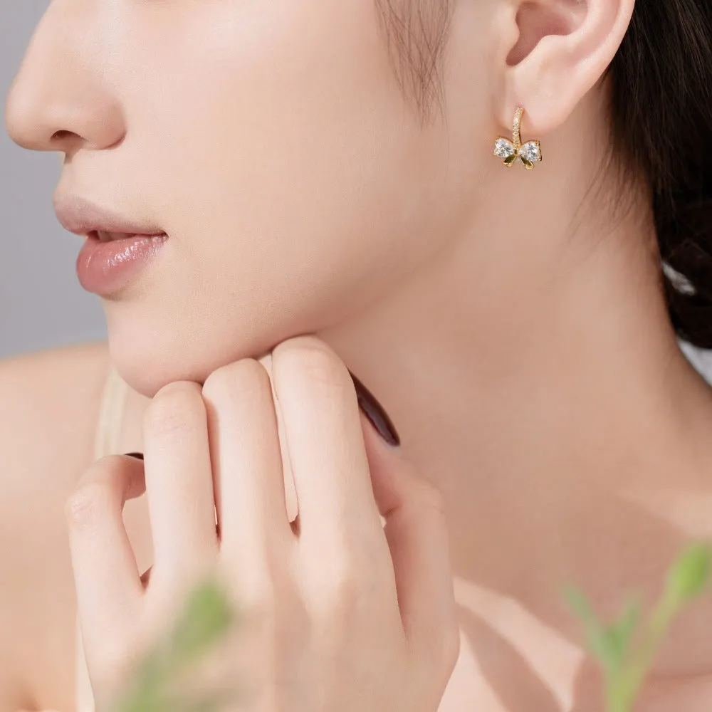 925 silver bowknot ear studs electroplated platinum finish on white background