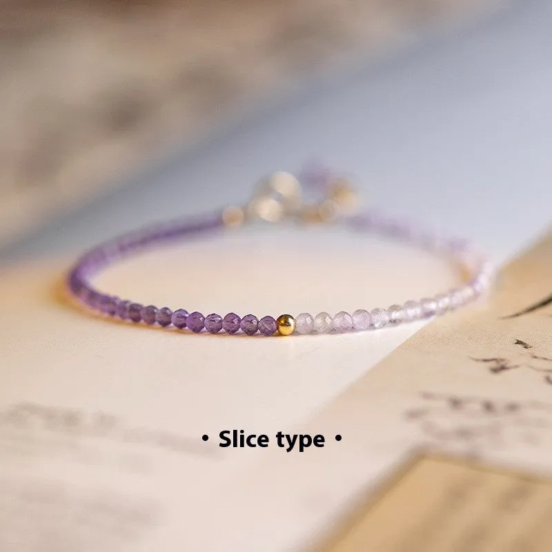 Close-up of a purple geometric rattan crystal bracelet with 2mm thickness and cut facets.