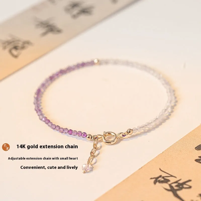 Close-up of a purple geometric rattan crystal bracelet with 2mm thickness and cut facets.