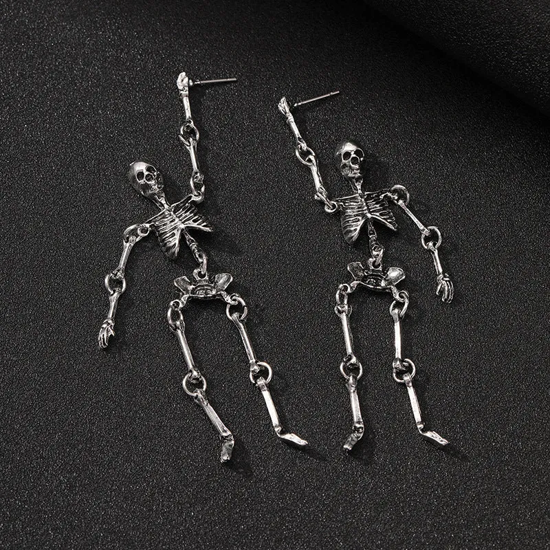 Exaggerated skull frame earrings in antique silver, zinc alloy electroplated finish, unisex design with hook fastening on white background