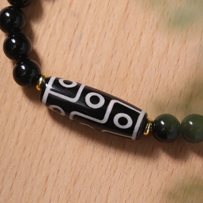 Tibetan Dzi bead bracelet made from obsidian agate with traditional ethnic patterns for unisex couple wear