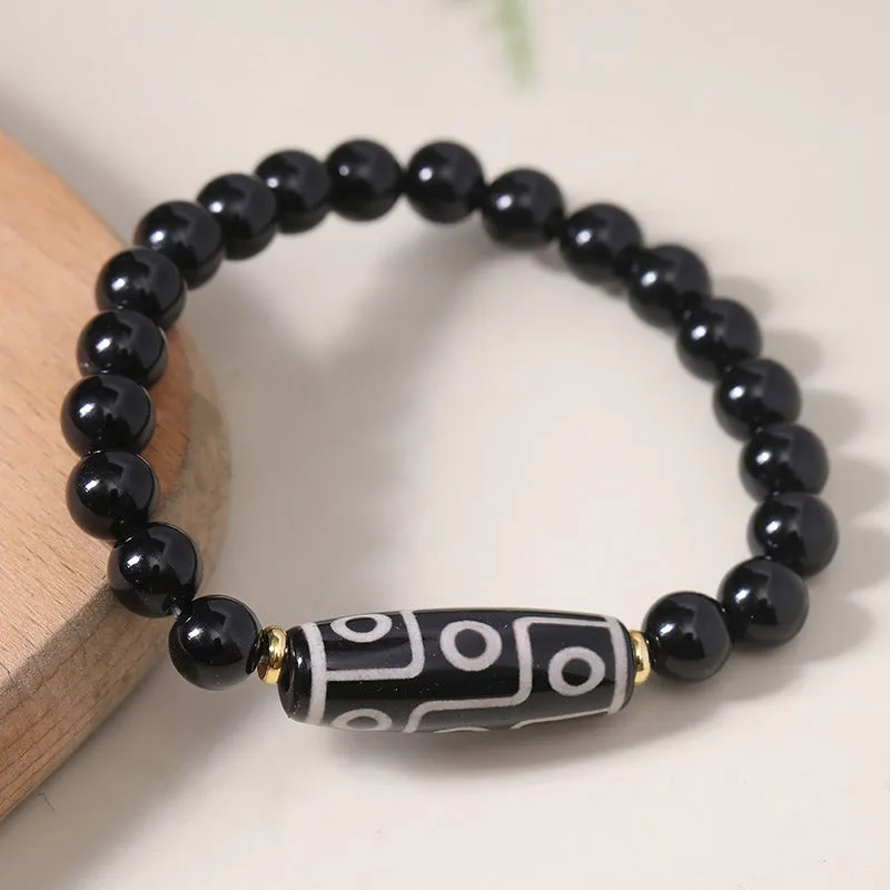 Tibetan Dzi bead bracelet made from obsidian agate with traditional ethnic patterns for unisex couple wear