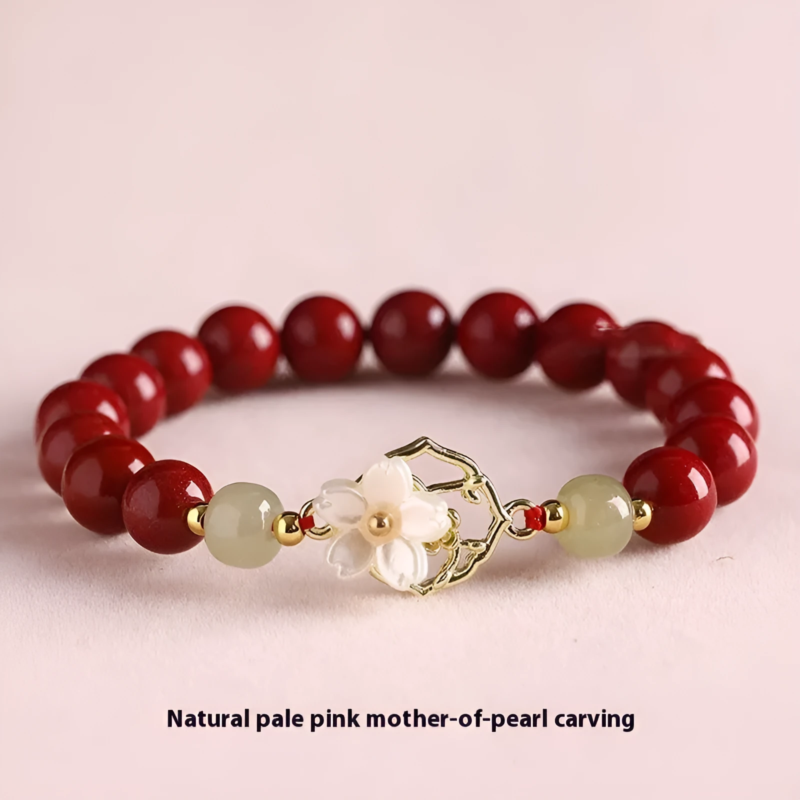 Cinnabar bracelet with Hetian Jade lotus charm and Bells of Ireland accents in New Chinese style