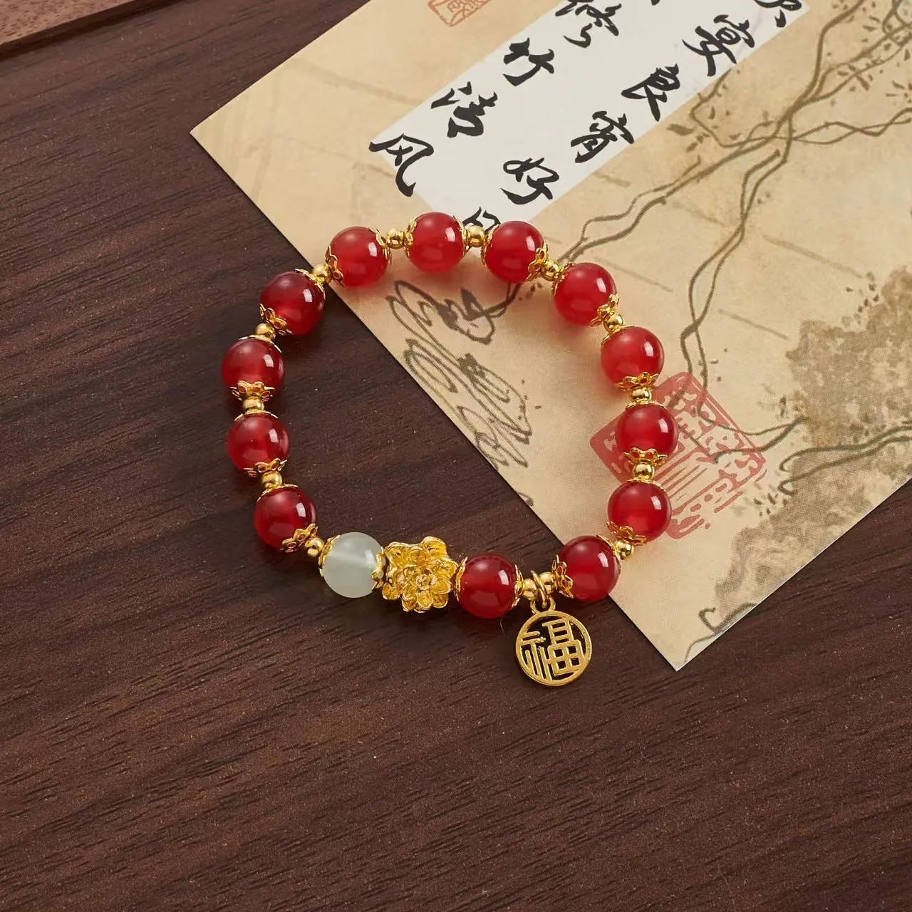 Coloured glaze Chinese bracelet with mixed materials in leaf, drop, and star shapes