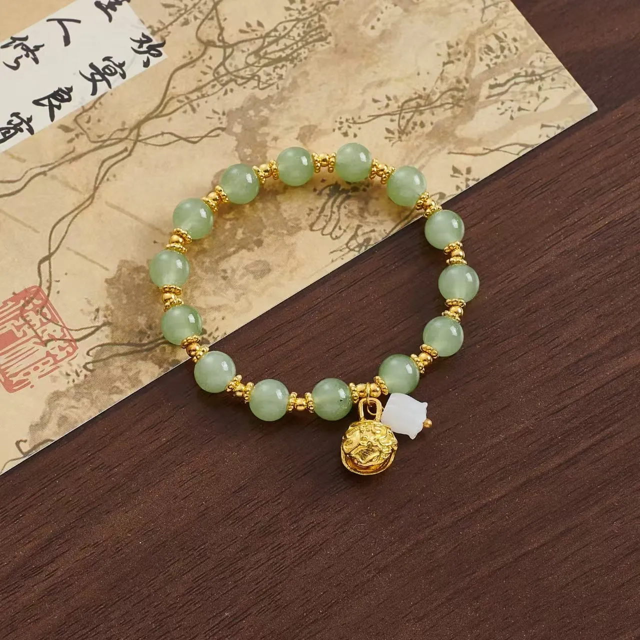 Coloured glaze Chinese bracelet with mixed materials in leaf, drop, and star shapes