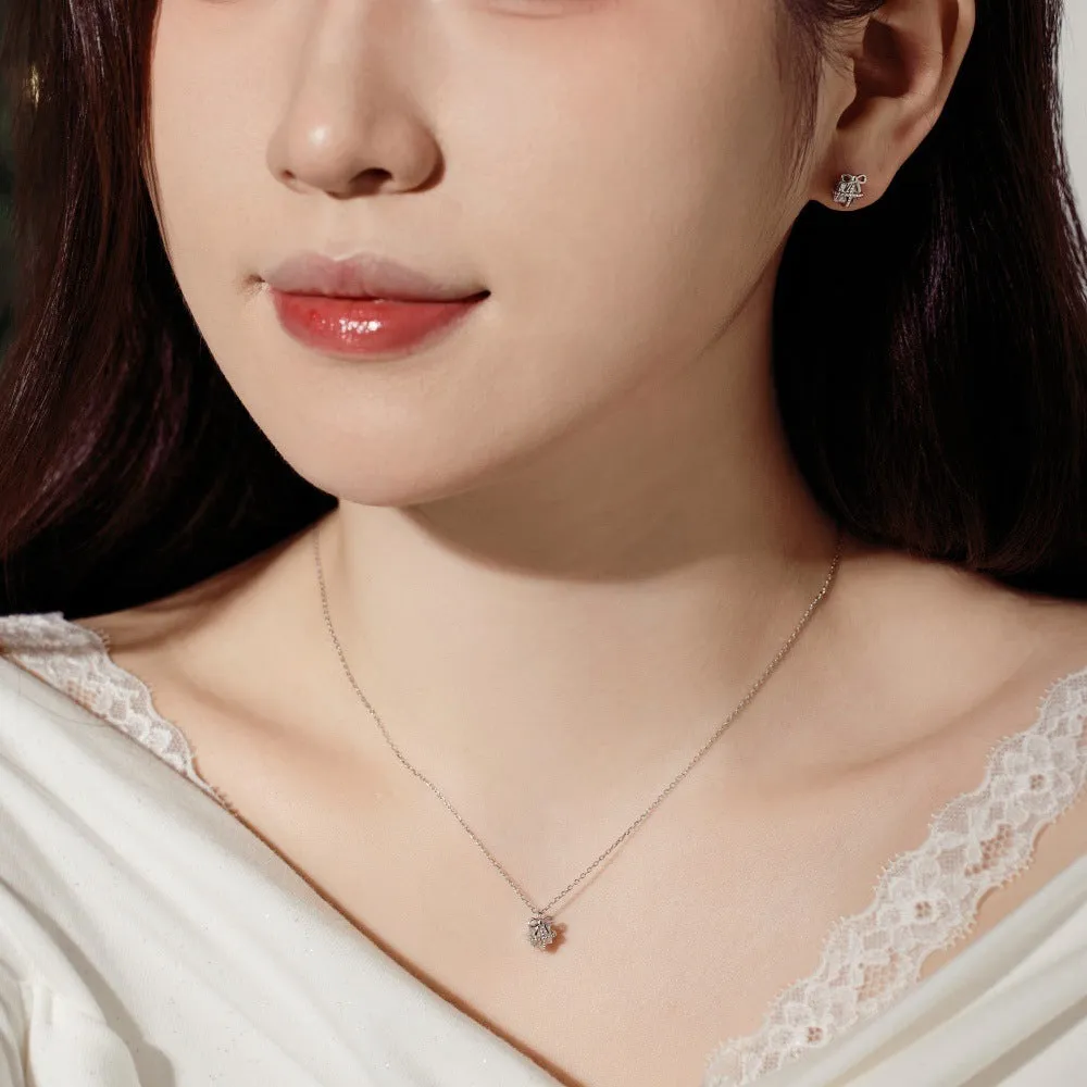 S925 sterling silver necklace and earring set with bear pendant in gold finish on display