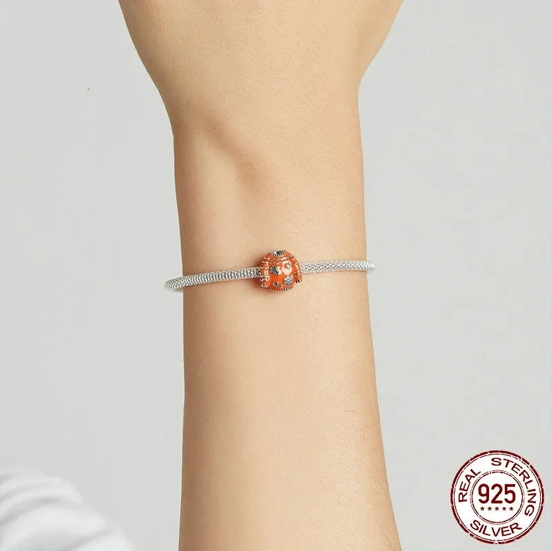 925 sterling silver bead with dripping oil finish, 1.1cm height and width, 0.45cm aperture, colour SCC1998