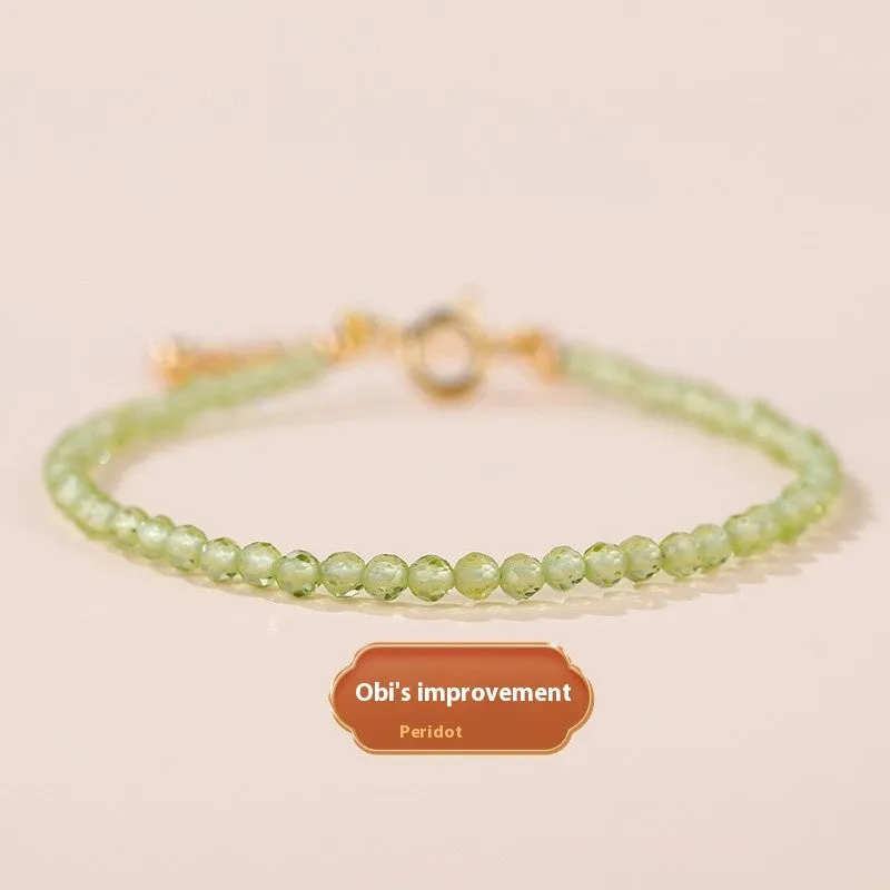 Natural strawberry quartz bracelet with 3mm polished diamond-cut beads on an adjustable cord