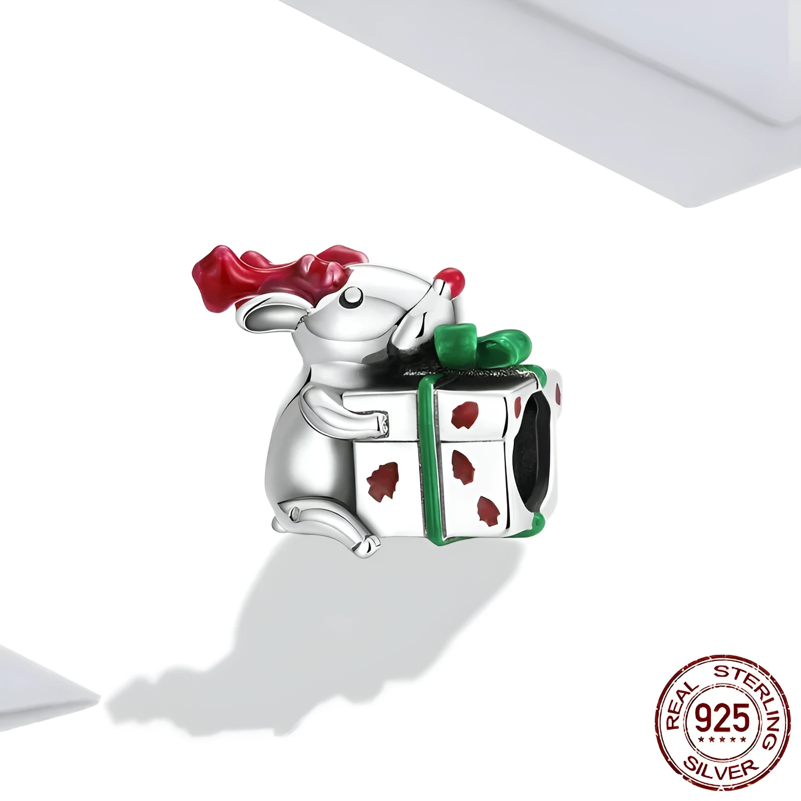 Single 925 sterling silver reindeer bead with dripping oil finish, 1.1x1.4 cm, on white background