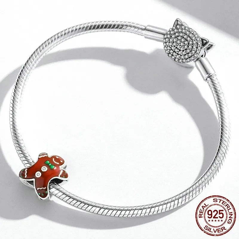 Christmas gingerbread man 925 sterling silver bead with dripping oil finish, 1.2cm height, 0.5cm aperture, on white background