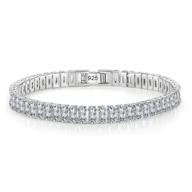 Women's simple diamond studded bracelet in gold finish with 4mm band width on white background
