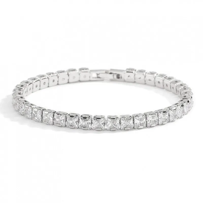 Women's simple diamond studded bracelet in gold finish with 4mm band width on white background